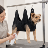 Black dog grooming hammock for paw cleaning