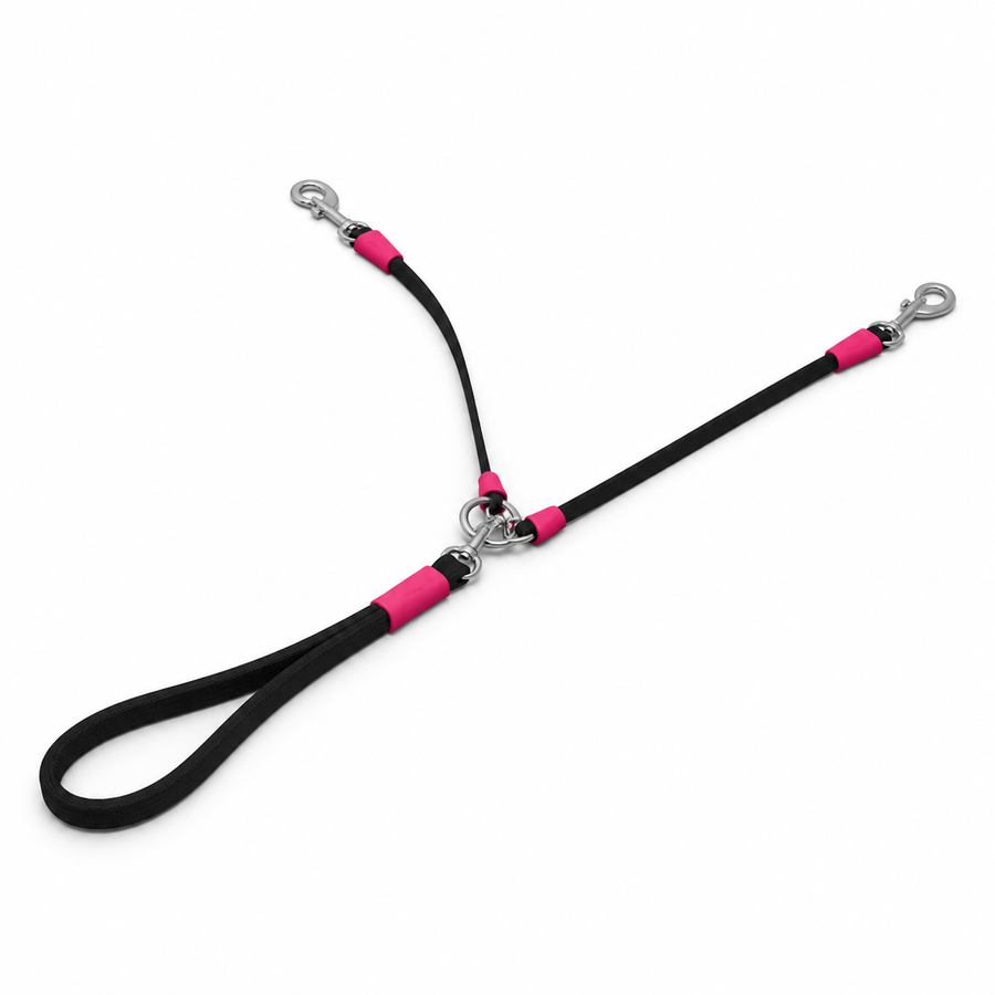 Black and hot pink dual dog leash with swivel splitter on white background